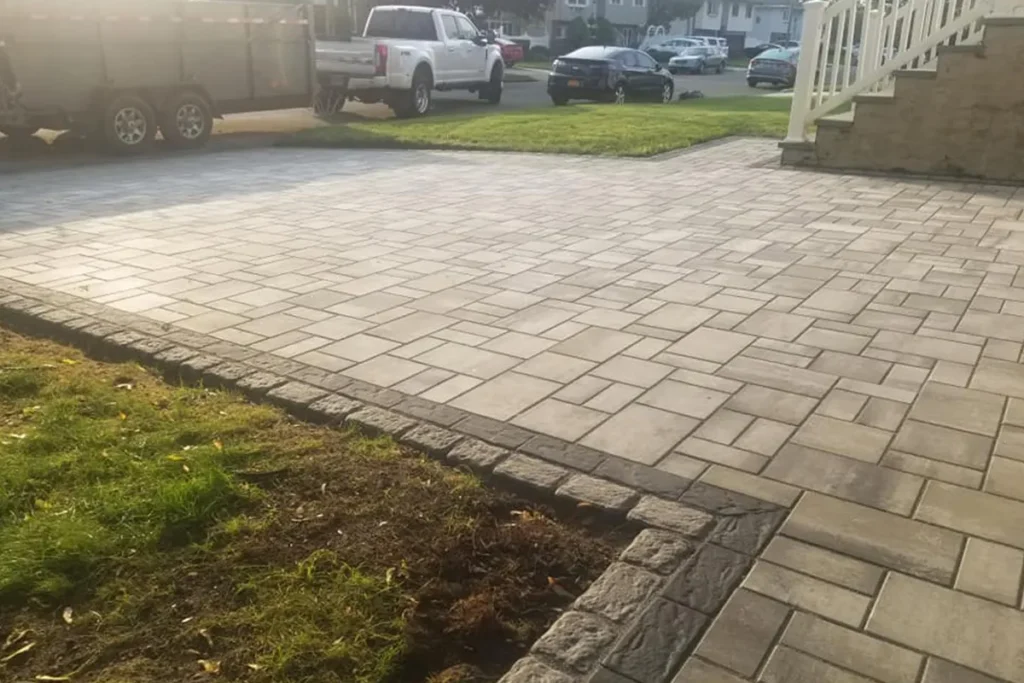 Paver patio with contrasting soldier-course border, detail view