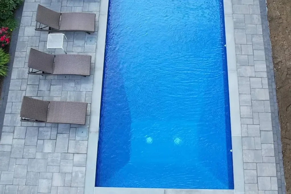 Rectangular lap pool with bluestone patio
